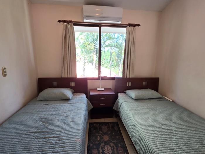 Green turtle # 22 Cozy 2BR Condo Just 10 Minutes from the Beach in Playas del Coco